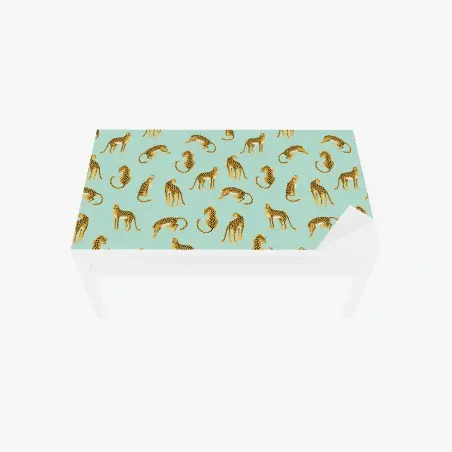 Table & desk veneer playful cheetah pattern on turquoise background • Wallissimo®
