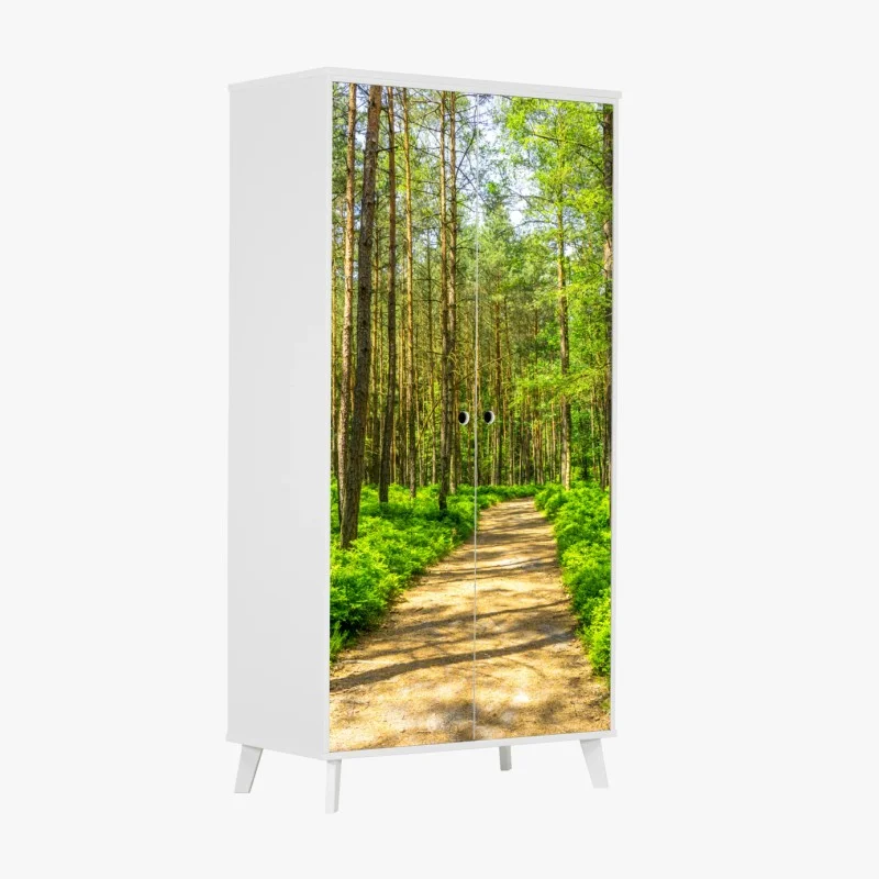 Wardrobe sticker sunlit forest path through green pines