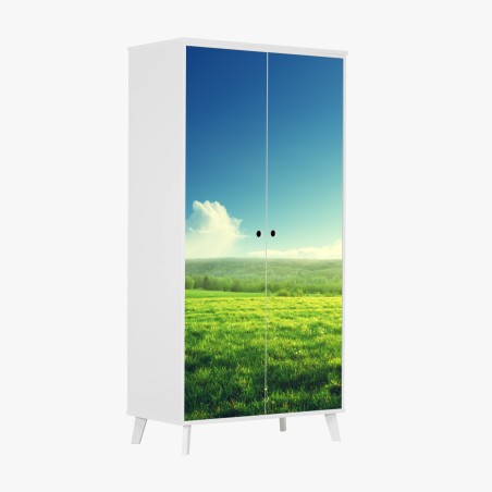 Wardrobe sticker sunlit spring meadow at sunset • Wallissimo®