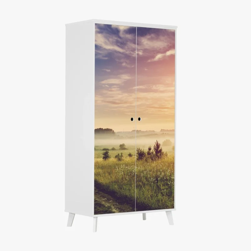 Wardrobe sticker misty sunrise over a rural meadow