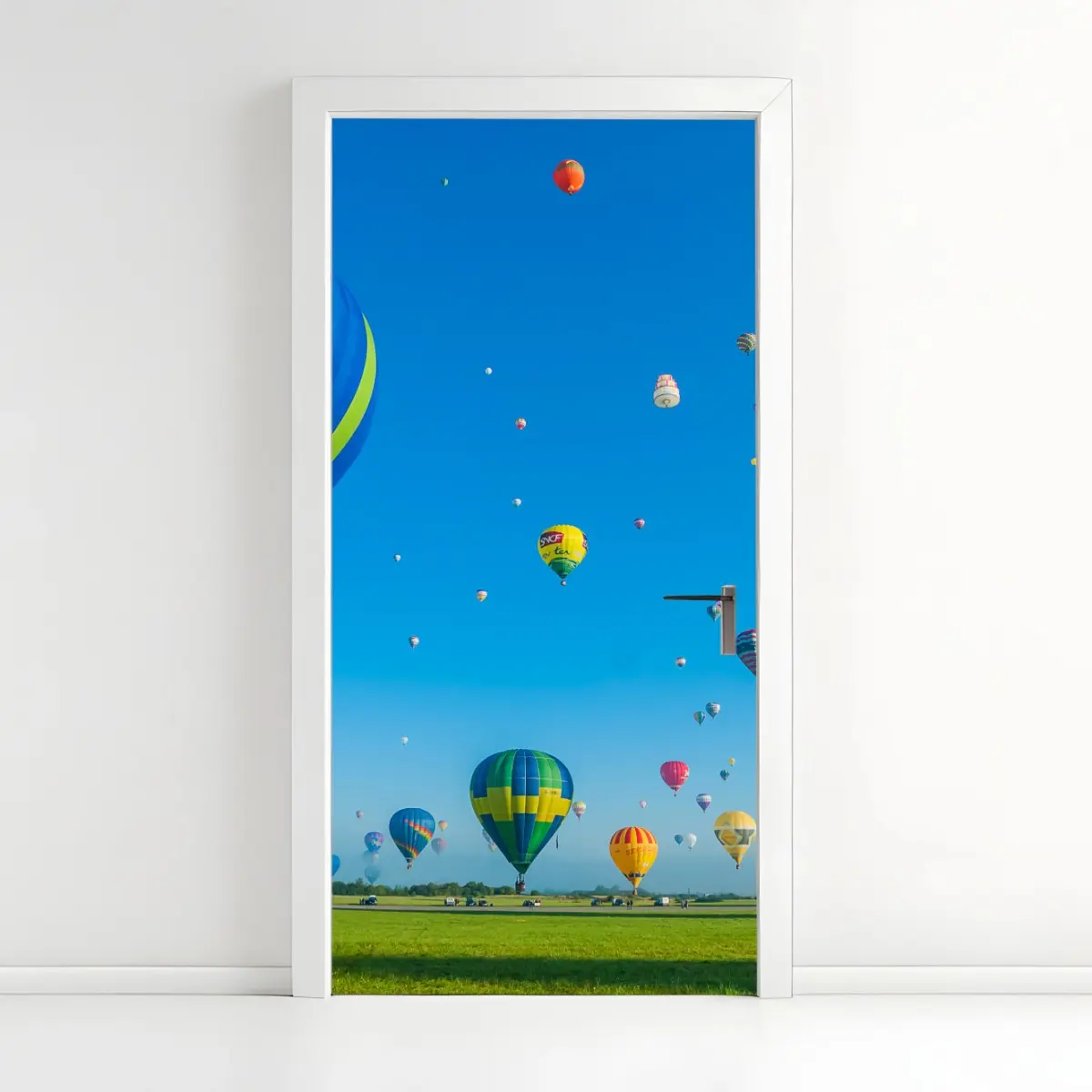 Door sticker colorful hot air balloons over Chambley • Wallissimo® Door sticker colorful hot air balloons over Chambley • Wallissimo®
