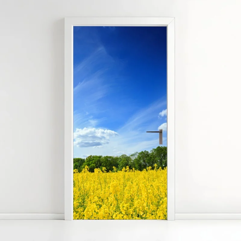 Door sticker Polish rapeseed field under blue sky