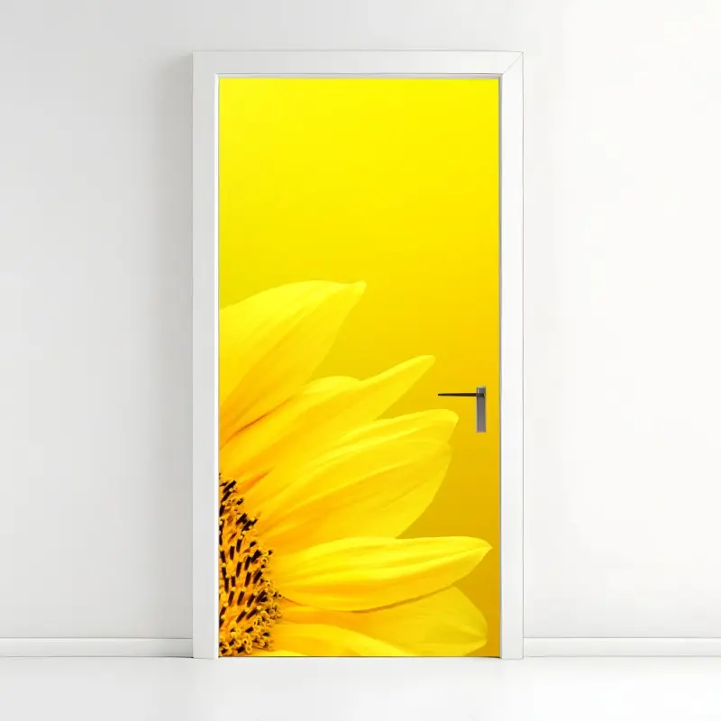Door sticker vibrant sunflower close-up on yellow background