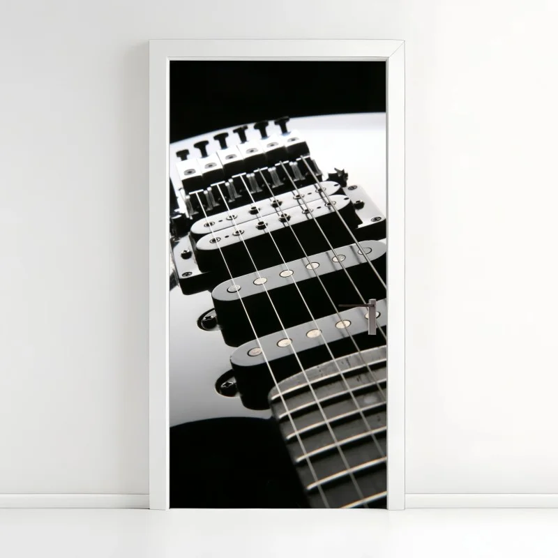 Door sticker black electric guitar close-up