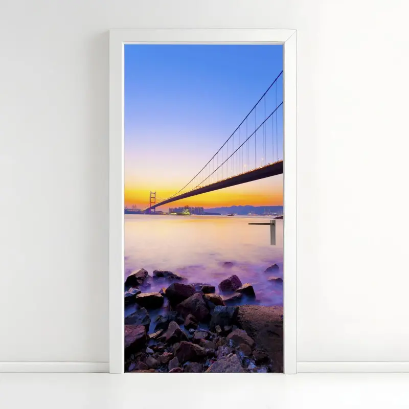 Door sticker golden sunset over suspension bridge