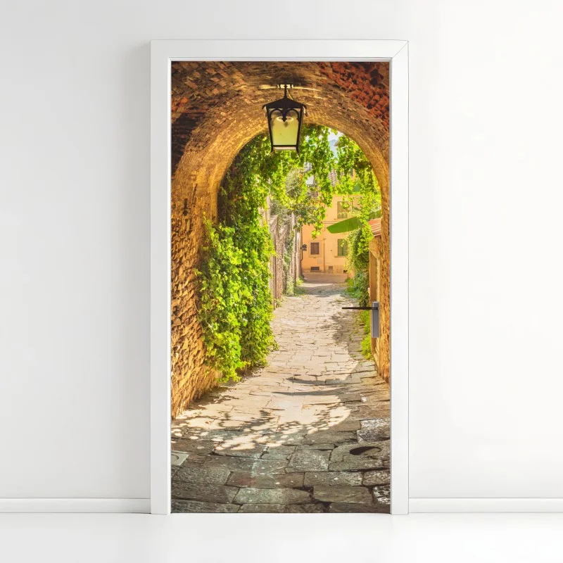 Door sticker sunlit alley in a Tuscan town