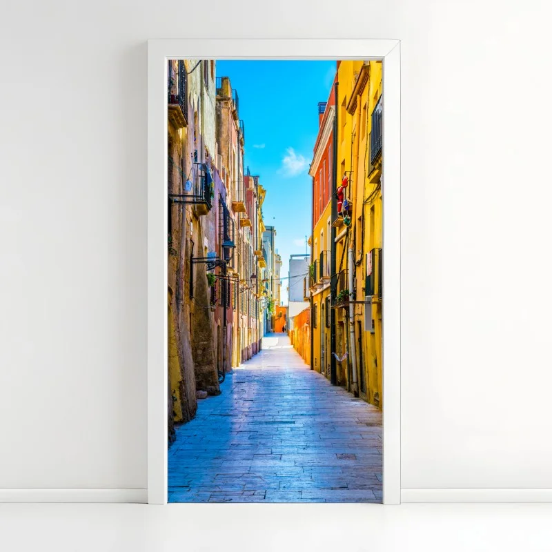 Door sticker sunlit Mediterranean street with colorful facades