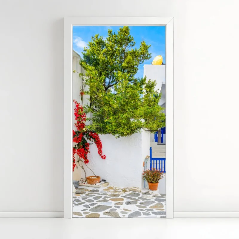 Door sticker sunlit Mediterranean courtyard with bougainvillea