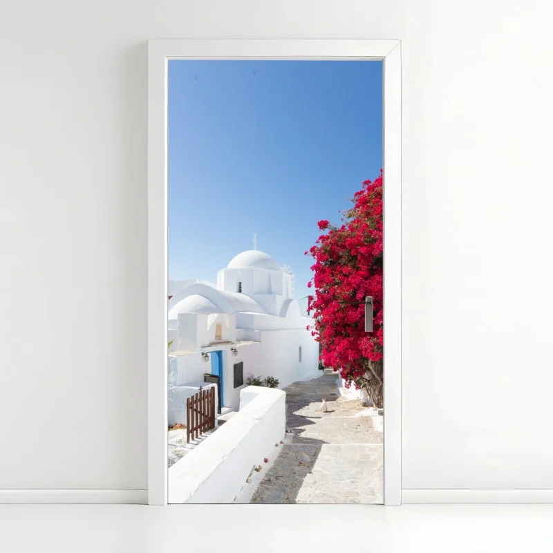 Door sticker sunlit island alley with vibrant bougainvillea