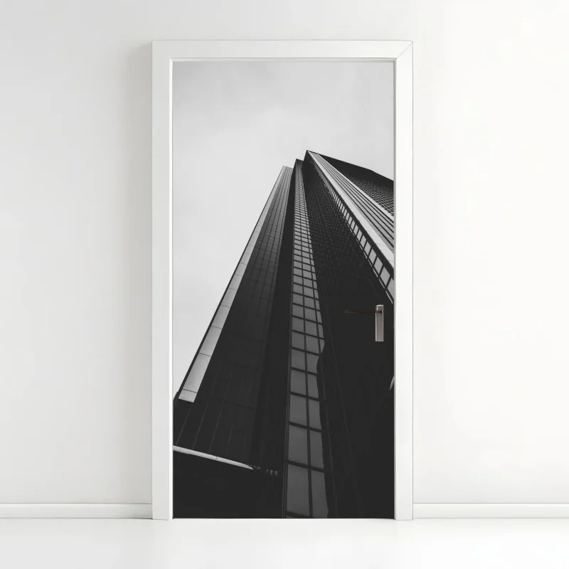 Door sticker towering modern skyscraper in monochrome