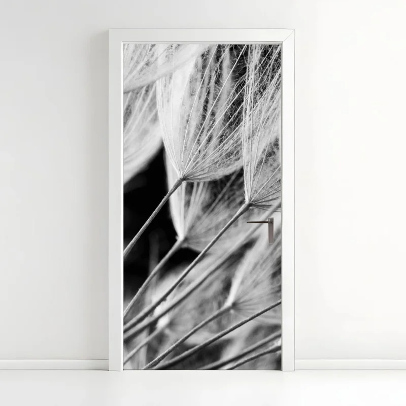 Door sticker delicate dandelion seed close-up in monochrome