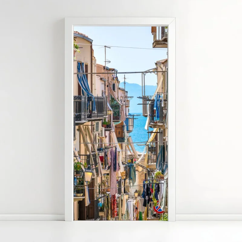 Door sticker sunlit mediterranean alley with sea view