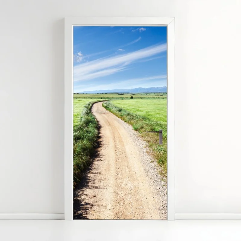 Door sticker winding country road through green meadows