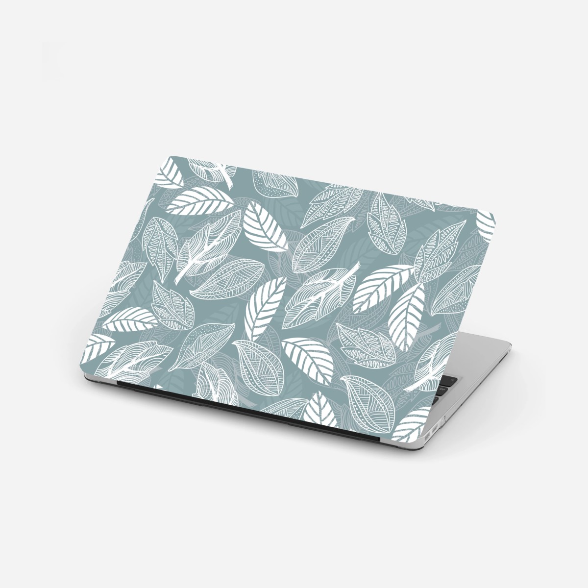Laptop sticker hand-drawn leaf pattern on teal background • Wallissimo® Laptop sticker hand-drawn leaf pattern on teal background • Wallissimo®