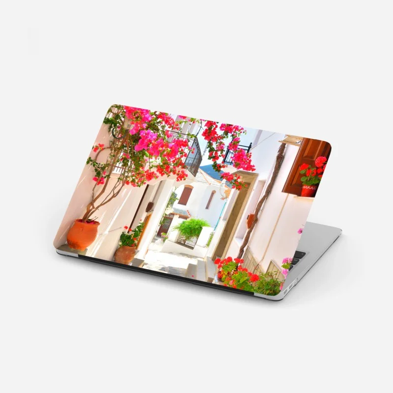 Laptop sticker sunlit mediterranean alley with bougainvillea