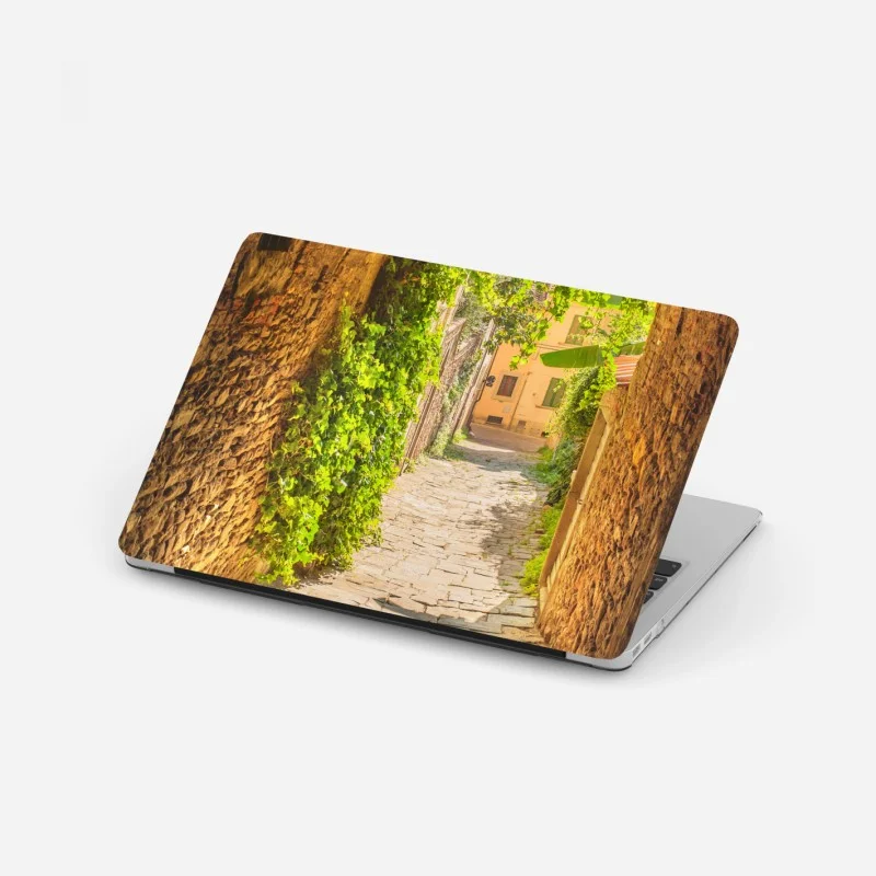 Laptop sticker sunlit alley in a Tuscan town