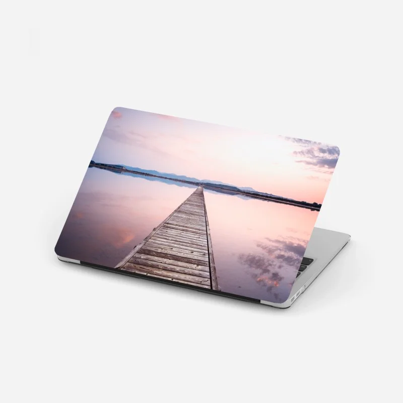 Laptop sticker pier to the horizon at sunset