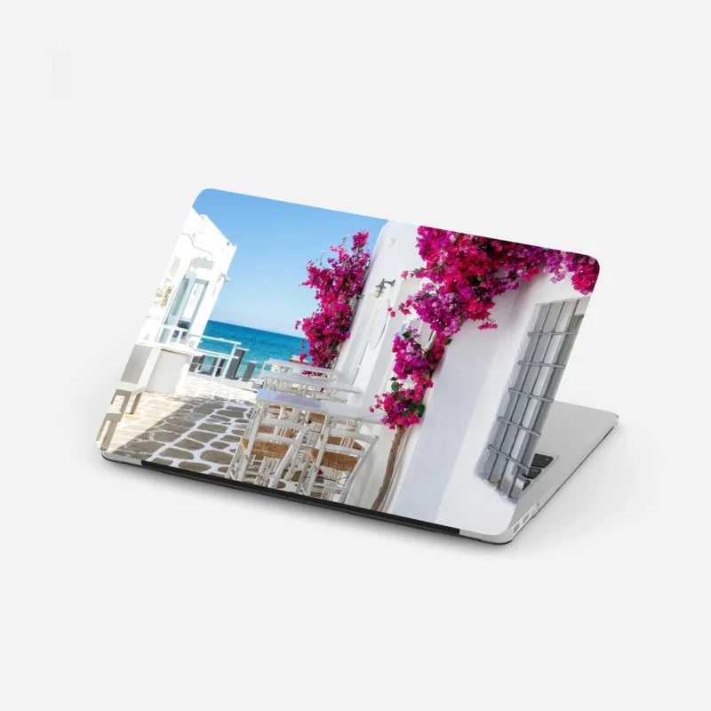 Laptop sticker sunny Mediterranean alley with bougainvillea