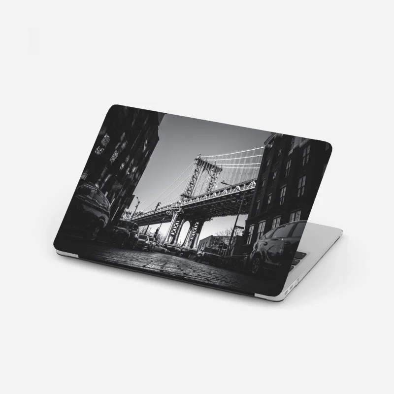 Laptop sticker Manhattan bridge perspective over cobblestone street