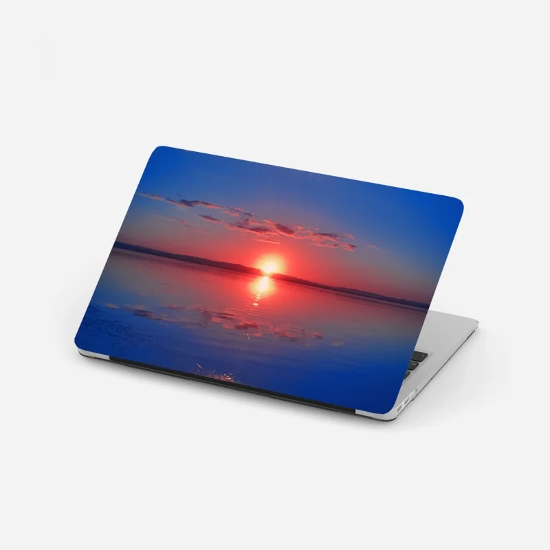 Laptop sticker sunset over calm sea with vivid reflection