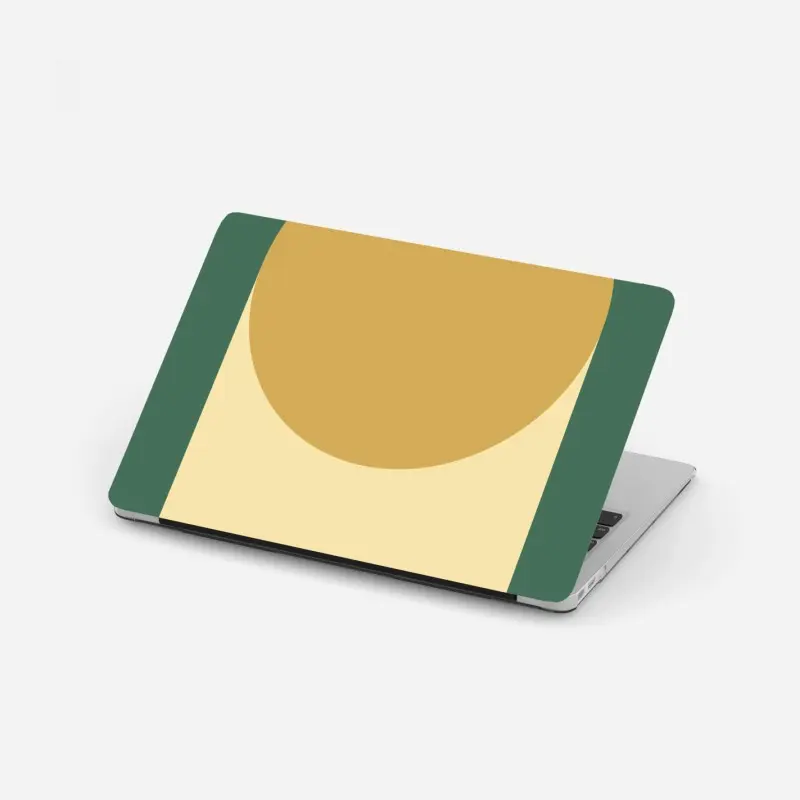 Laptop sticker golden sun over geometric block