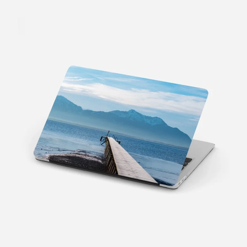 Laptop sticker misty mountain pier at dawn