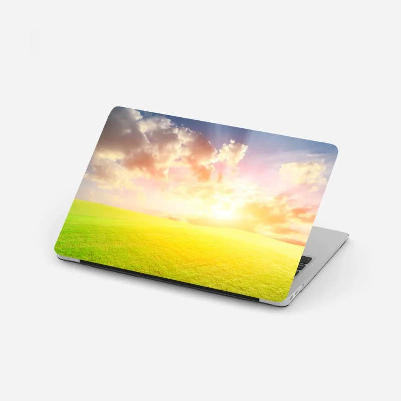 Laptop sticker sunlit meadow at sunset