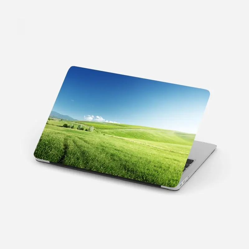 Laptop sticker tranquil green meadow landscape