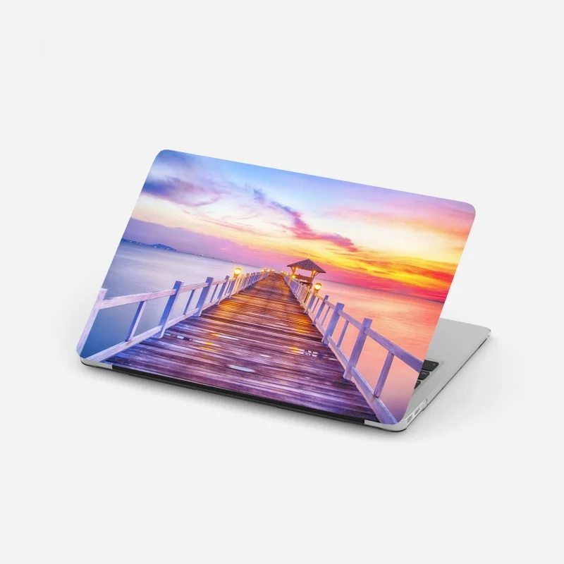 Laptop sticker sunset pier leading to tranquil horizon