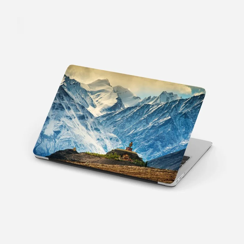 Laptop sticker majestic mountain monastery against snowy peaks