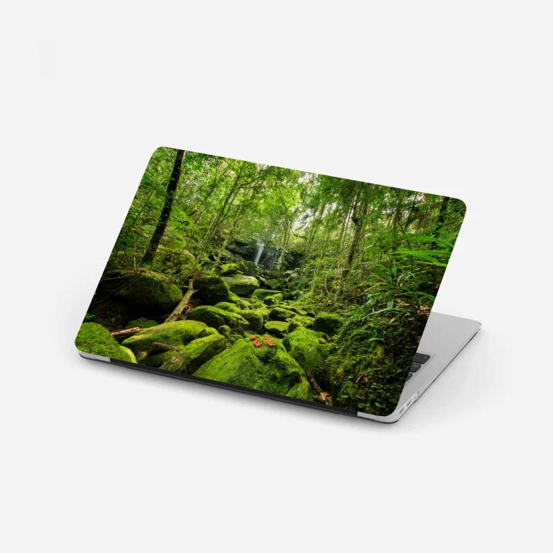Laptop sticker lush mossy waterfall in tropical forest