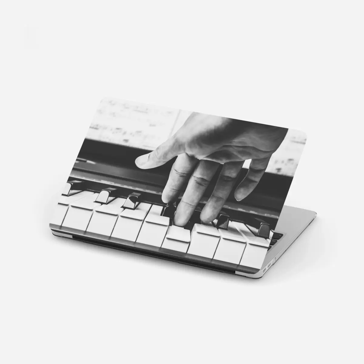 Laptop sticker hand on piano keys in grayscale ⁕ Wallissimo® Laptop sticker hand on piano keys in grayscale ⁕ Wallissimo®