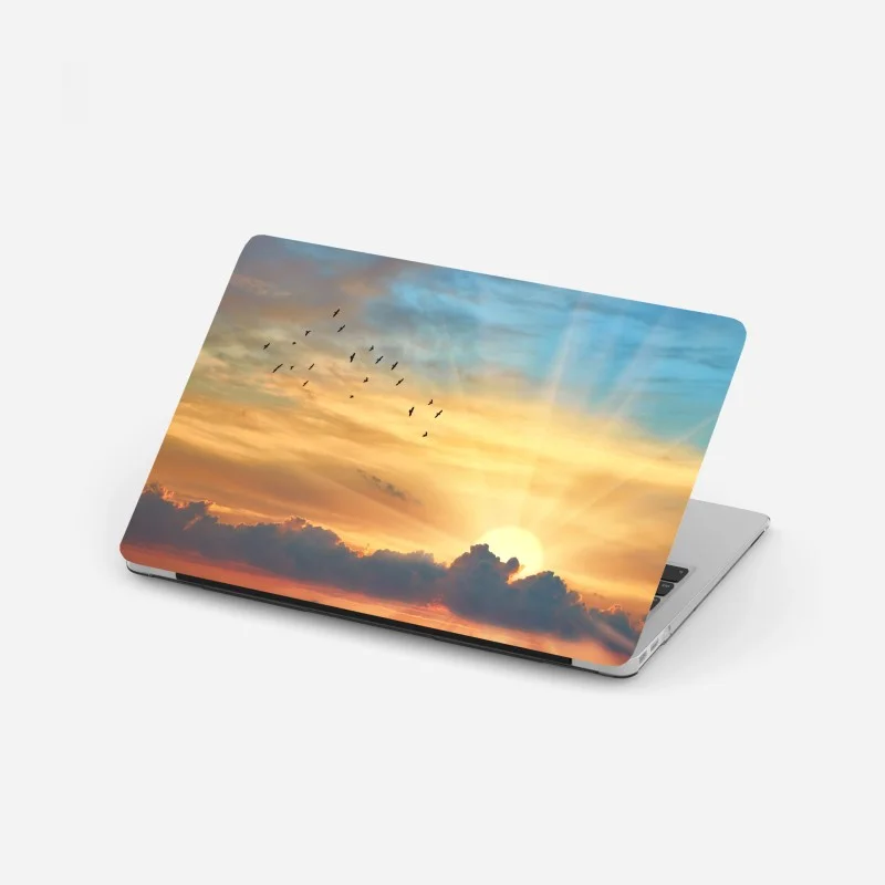 Laptop sticker golden sunrise over clouds