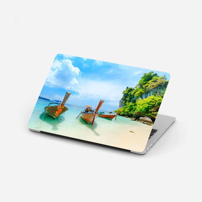 Laptop sticker longtail boats on a turquoise Phuket beach