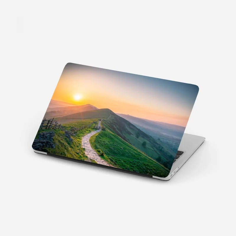 Laptop sticker sunrise ridge path over rolling hills