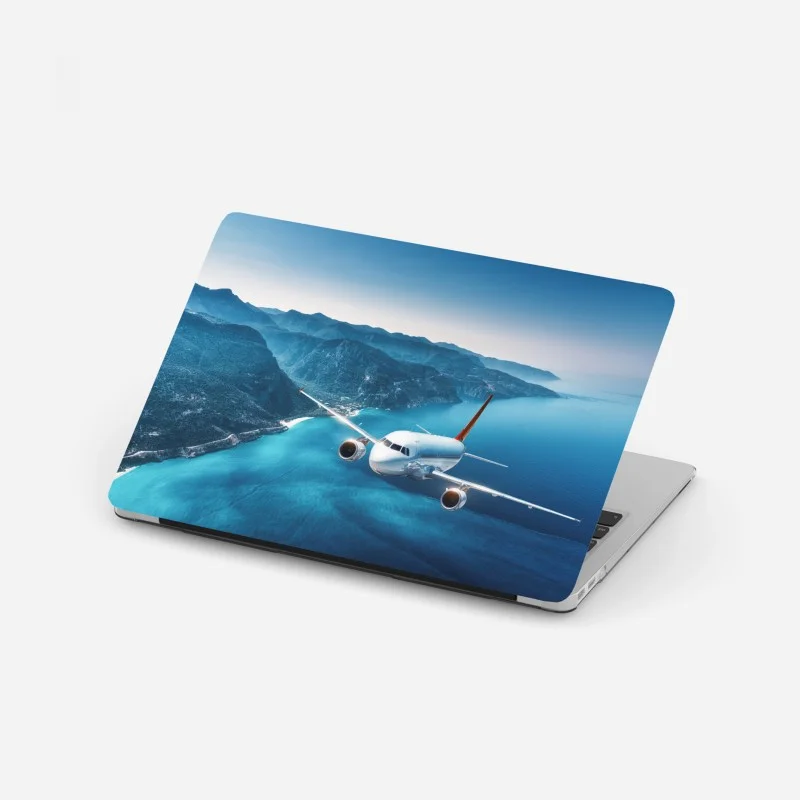 Laptop sticker coastal flight over turquoise sea