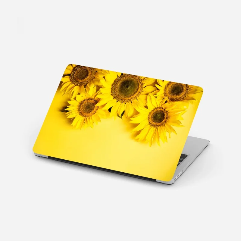 Laptop sticker bright sunflower bouquet on yellow background