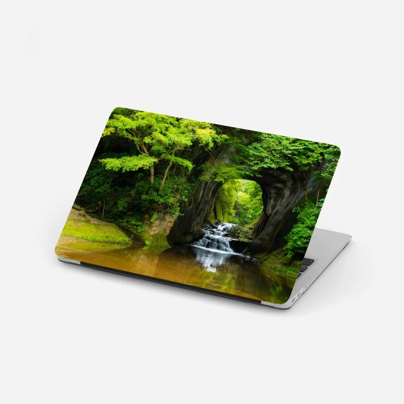 Laptop sticker hidden waterfall through a rock arch