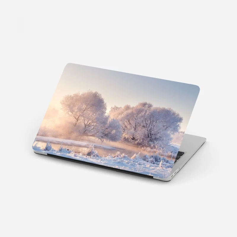 Laptop sticker frosted trees at sunrise