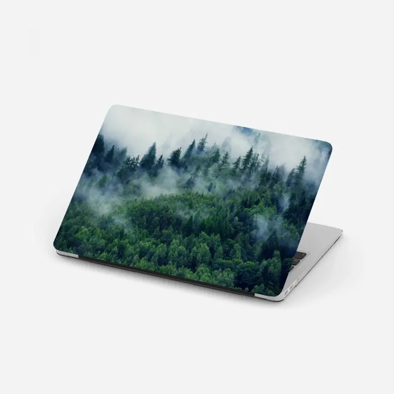 Laptop sticker misty green forest landscape
