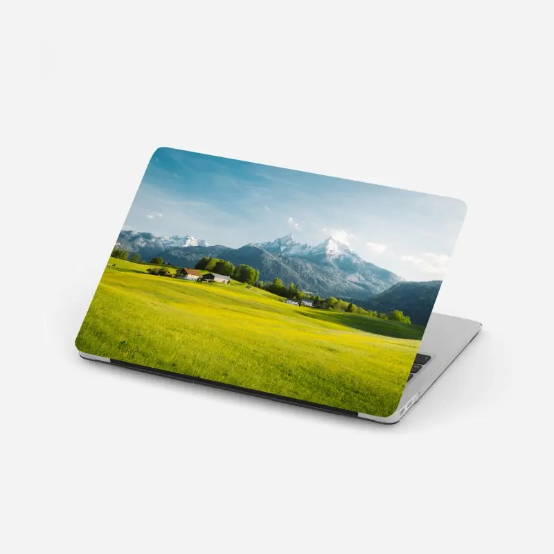 Laptop sticker alpine meadow beneath snowcapped peaks