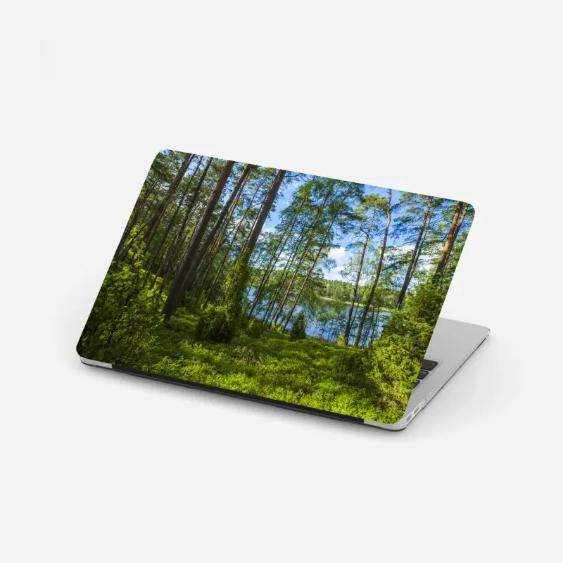 Laptop sticker tranquil pine forest by the lake