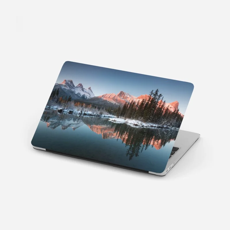 Laptop sticker sunlit mountain reflection at dawn