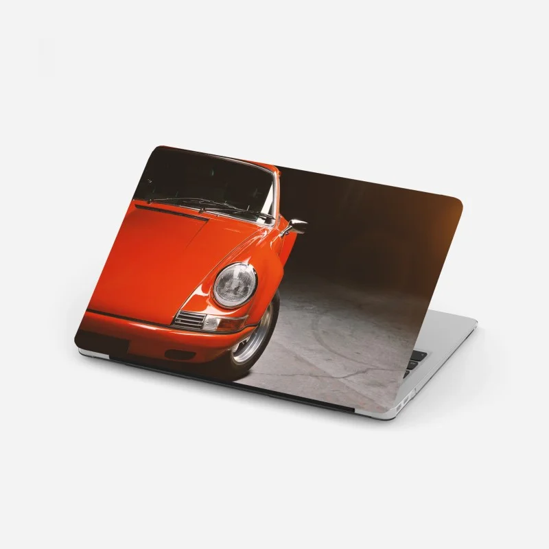 Laptop sticker red vintage sports car close-up