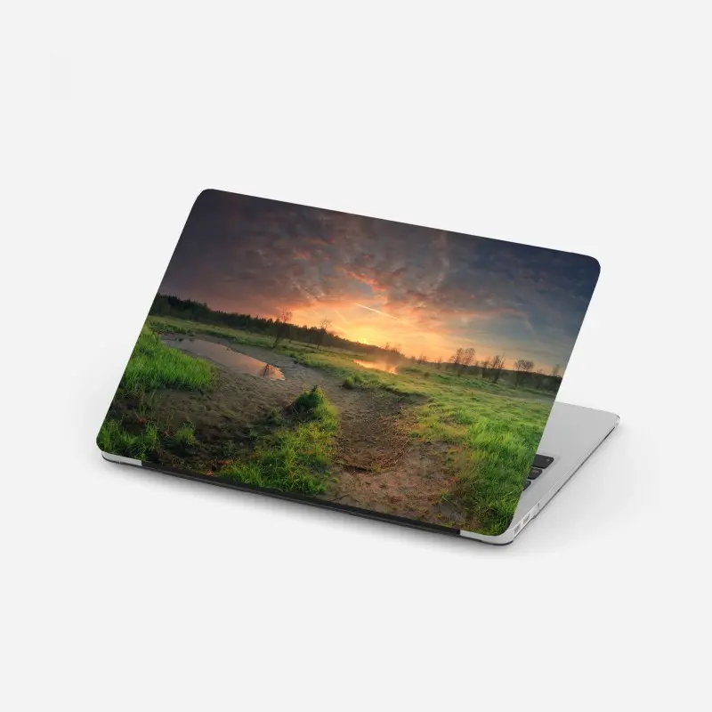 Laptop sticker sunset over a peaceful meadow