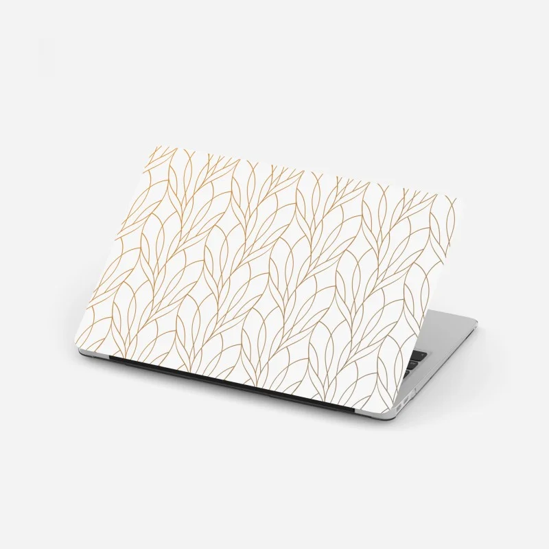 Laptop sticker golden leaf pattern on white background