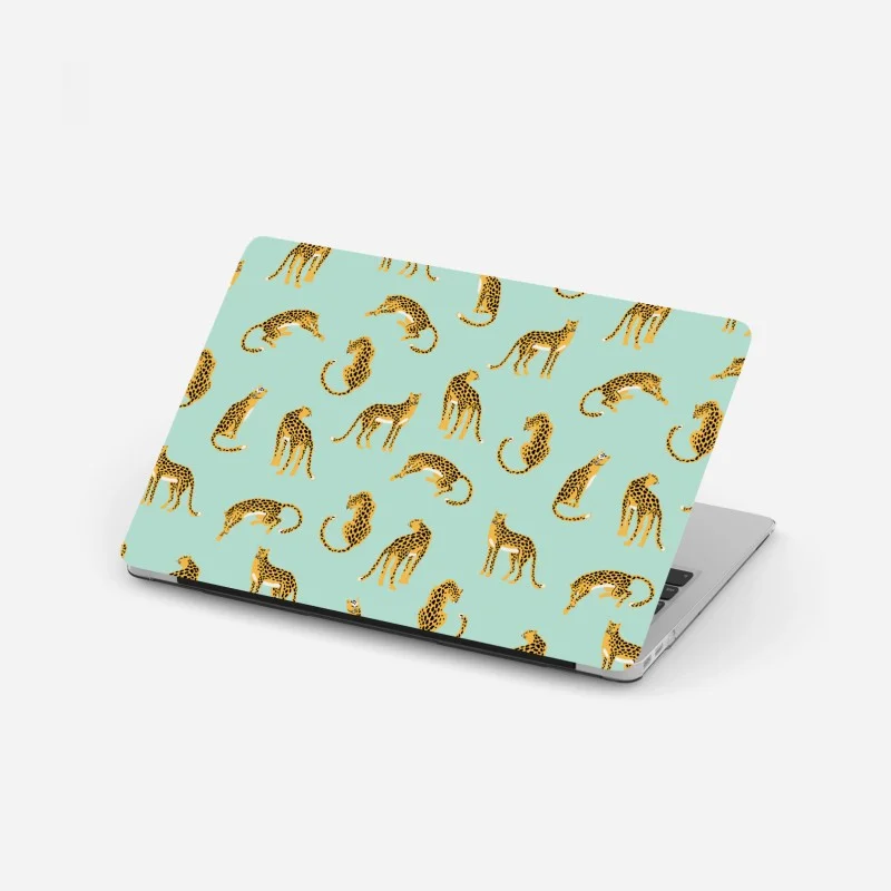 Laptop sticker playful cheetah pattern on turquoise background