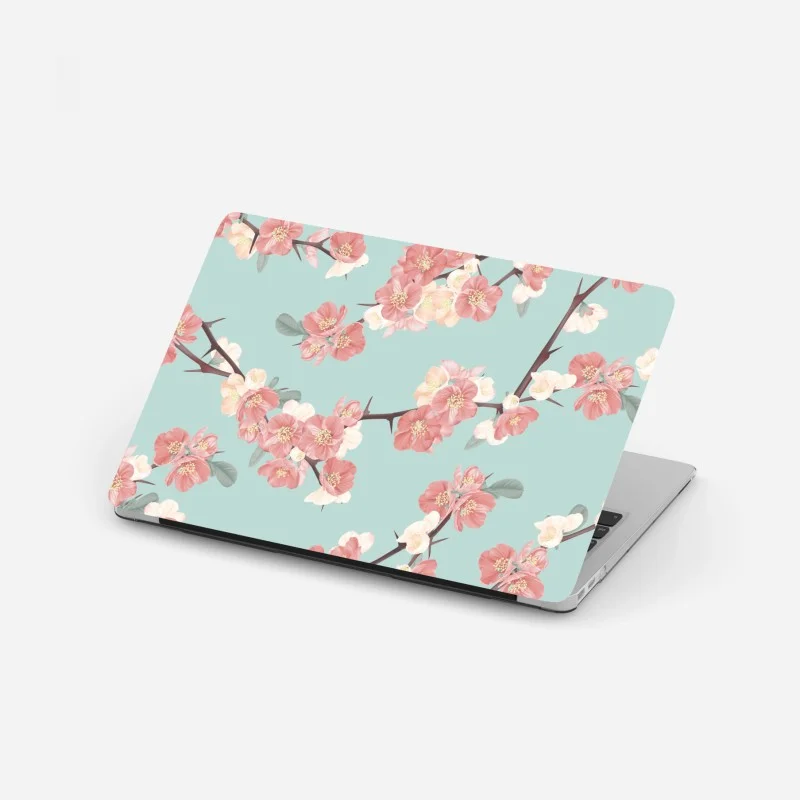 Laptop sticker pastel cherry blossom pattern on turquoise