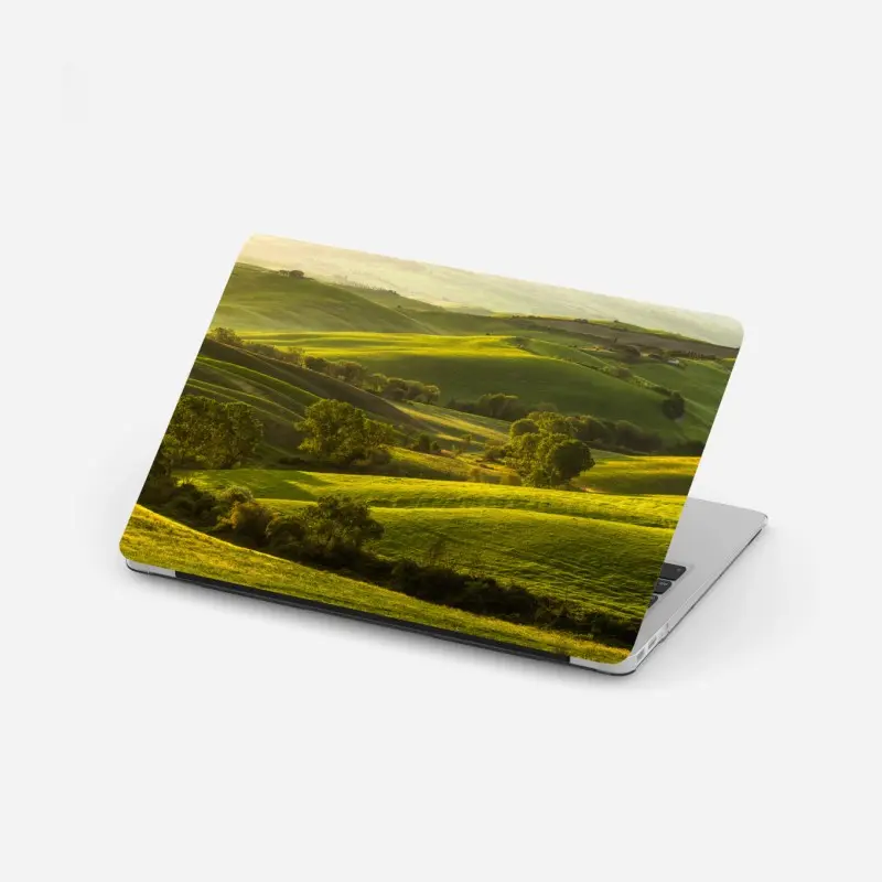 Laptop sticker sunlit rolling green hills
