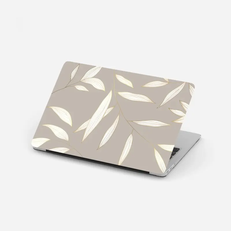 Laptop sticker delicate gold-lined leaves on beige background
